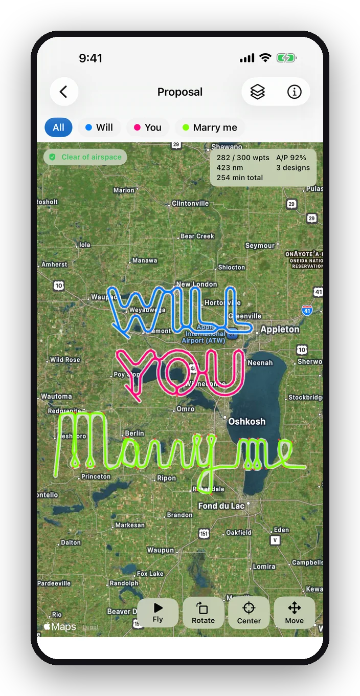 A folder spelling WILL YOU Marry me down the map in three colors
