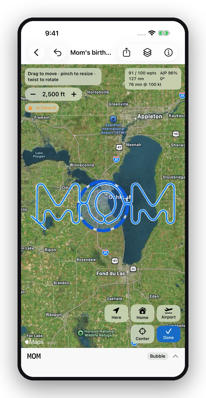 MOM over Oshkosh in Move mode: altitude 2,500 ft, an orange “In Class D” alert, the Class D outlined, and Here, Home and Airport buttons